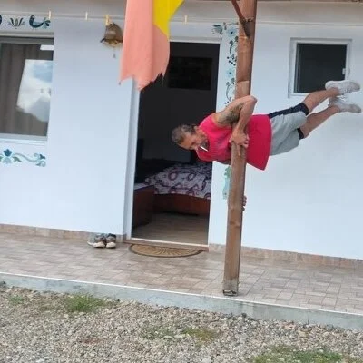 Tomi
