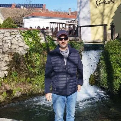 Tomi
